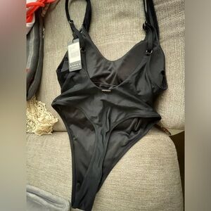 Black thong swimsuit